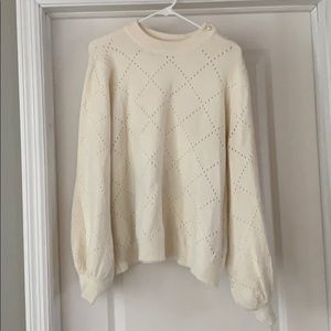 Cream sweater with detailing